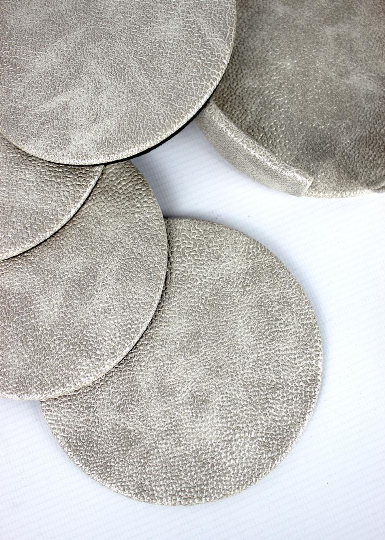beige farbene Glasuntersetzer im 4er Set