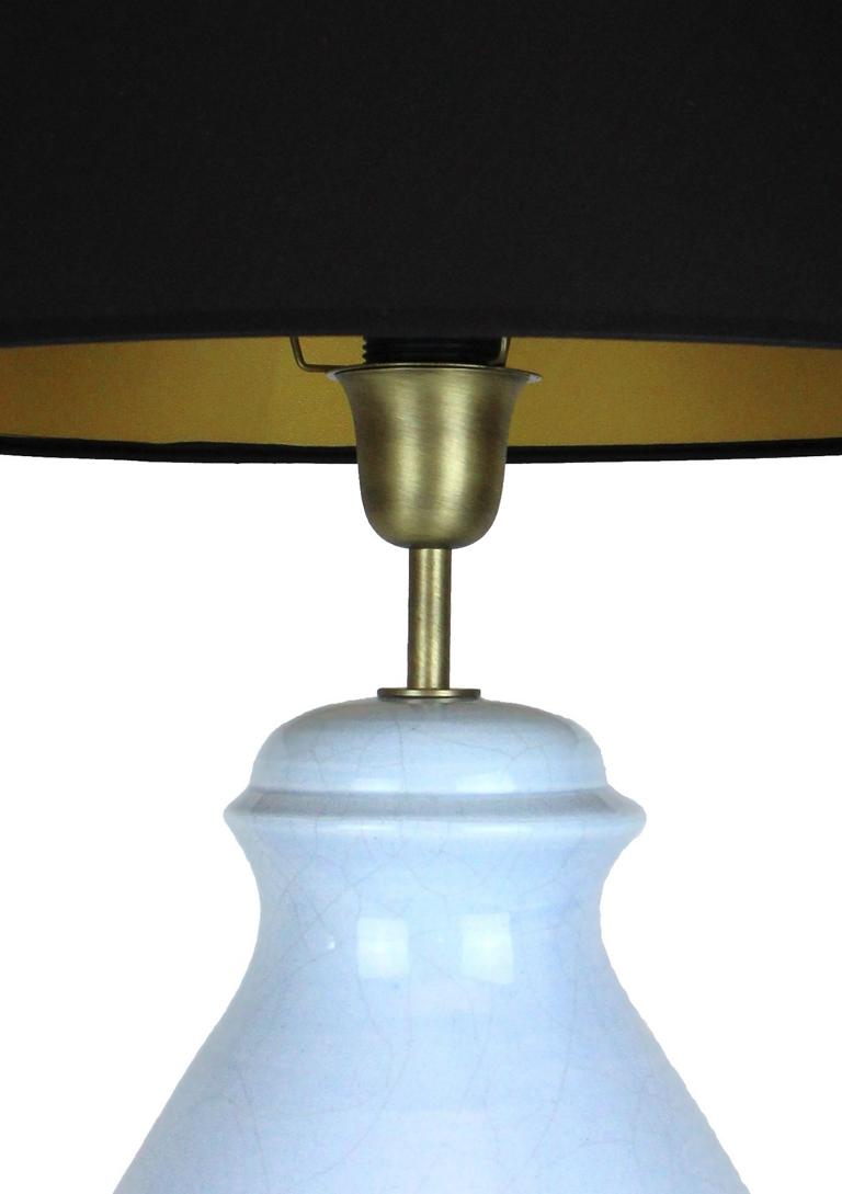 Keramiklampe blau mit Messing